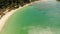 Las Cabanas Beach. Islands and beaches of El Nido.Tourists relax on the white beach.