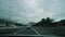 Las Palmas de Gran Canaria, SPAIN - April, 23, 2019 - Timelapse highway on an island on a cloudy day. First-person road