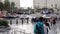 LAS VEGAS, NEVADA USA - 5 MAR 2020: People on pedestrian walkway. Multicultural men and women walking on city promenade