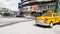 LAS VEGAS, NEVADA USA - 7 MAR 2020: Yellow vacant mini taxi cab close up on Harmon avenue corner. Small retro car model