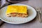 Lasagna on a gray background. Italian cuisine