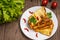 Lasagna, traditional Italian food on a wooden background