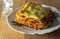 Lasagne serving on dinner plate - Slice of lasagna meat pasta cl