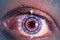 Laser or lasik eye surgery concept, african american male brown eyes with digital overlay