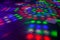 Laser lights on the dance floor perhaps with spilt drink