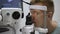 Laser vision correction. Doctor checks patient eyes using autoref keratometer
