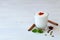 Lassi drink with red pepper and fresh green mint on white background