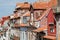 Last floors of old mansions on old streets of city Porto with tile roofs. Cityscape in Portugal