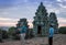 Last tourists at the top of the Phnom Bakheng temple photogra