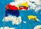 Latacunga, Ecuador, September, 28, 2018: Outdoor view of three flags waving in a gorgeous blue sky background with some