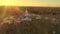 Late Afternoon Fall Aerial View with Sun Rays of Beautiful Restored Barns