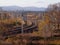 Late autumn. Railway on the background of mountains.