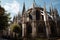 late-gothic cathedral with flying buttresses, stained glass windows, and detailed stone carvings