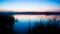 Late, quiet and peaceful summer evening on a large countryside pond