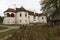 The late-renaissance Kalnoky castle mirroring in pond Miclosoara. Landscape garden, pond, gazebo.