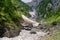 Late Summer snow in the White Valley, an unmarked alpine route in Bucegi mountains, Romania