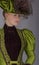 Late Victorian woman in green silk ensemble