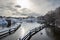 Late winter seascape view with a sluice and canal in hazy light.