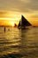 Lateen sail at sunset