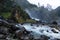 Latefossen unique waterfall side rock lightened in dark