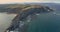 Lateral movement in an general aerial view near sea getting closer to the coastline with a lot of cliffs