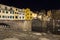 Lateral view at night of historic bridge in Florence