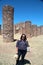 Latin adult woman tourist with sunglasses and hat knows the archaeological zone La Quemada in Zacatecas Mexico in a desert area of