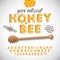 Latin alphabet and numbers made of honey