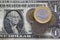 Latin america coins over one dollar bill. Brazilian money, Uruguay, Argentina and Colombia money