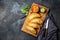 Latin American fried empanadas with tomato and avocado sauces. Top view