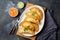 Latin American fried empanadas with tomato and avocado sauces. Top view