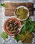 Latin American Mexican Chilean cuisine. Ninos envueltos. Grape leaves stuffed wish meat on clay plate