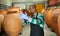 Latin american winemaker inspecting quality of wine at winery