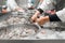 Latin American workers inspecting frozen farmed shrimp at an industrial food plant