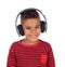 Latin child with headphones an red sweater