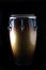 Latin Conga drum on a black Bk