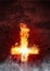 Latin Cross bursting with flames
