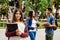 Latin female student, Hispanic girl in Mexico and group of mexican students at Background in Mexico