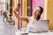 Latin girl, Young woman taking selfie portrait in coffee shop in Mexico