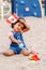 latin hispanic baby toddler girl holding waving Canadian flag