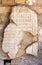 Latin illegible inscritption on ancient stone, Tarraco, Tarragon