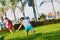 Latin kids playing in the summer park.