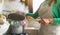 Latin mature woman cooking in old vintage kitchen - Mother preparing lunch for the family at home