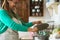 Latin mature woman cooking in old vintage kitchen - Mother preparing lunch at home