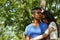 Latin teen couple with emotions, outdoors