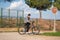 Latin teenage boy with dark hair riding a bike