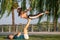 Latin woman and Caucasian man do yoga exercises in a park in Madrid. Balance and concentration in couple