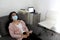 Latin woman and doctor with protection mask in medical exams performing electroencephalogram and brain mapping in times of covid-1