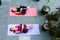 Latin women doing yoga on the floor with knees to chest and eyes closed on the terrace at home