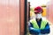 Latin worker with protective mask, hard hat and safety vest